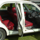 Illustration for article titled Miniature Nissan modified to look like vintage Jaguar on Ebay